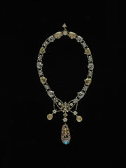 silver and blue gemstone pendant necklace