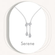 Silver necklace labeled 'Serene' by Silvius on a white background