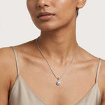 Load image into Gallery viewer, Woman wearing a necklace with a neutral background